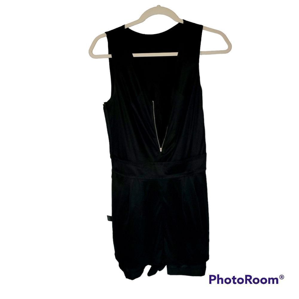 Express black Romper size 4. ^